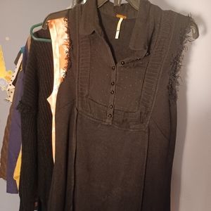 Free people dress. Black w/ blue lacing around the bottom. Mini length.